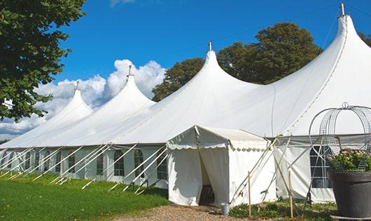 multiple portable restrooms in a row for added convenience at a concert venue in Cranbury, NJ